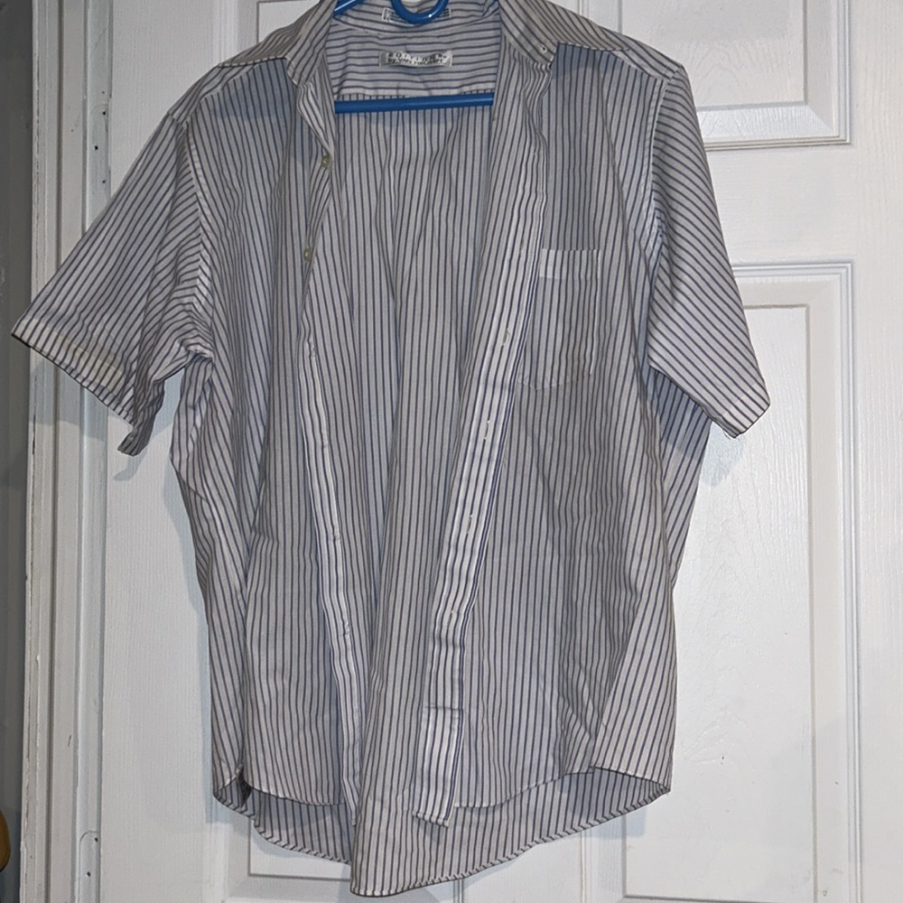 Buy 1 get 1 free vintage  shirt.  Button up, pocket.